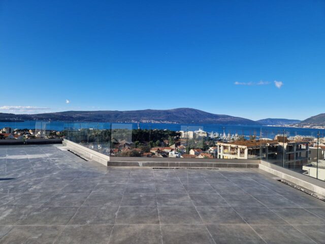 Penthouse with panoramic sea view and roof terrace in Tivat