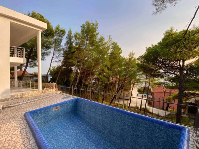 Villa with a pool and a sea view