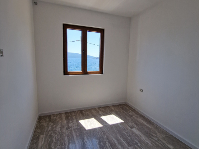 Two-bedroom apartment on the first line of the sea in Tivat
