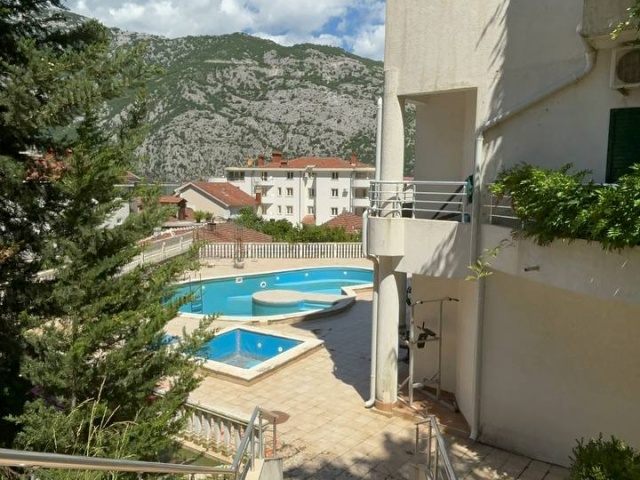 Two bedroom apartment in a residential complex with a swimming pool in Kotor
