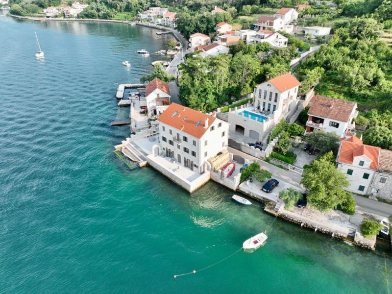 Stone villa and mini-hotel on the seashore in the Bay of Kotor in Montenegro