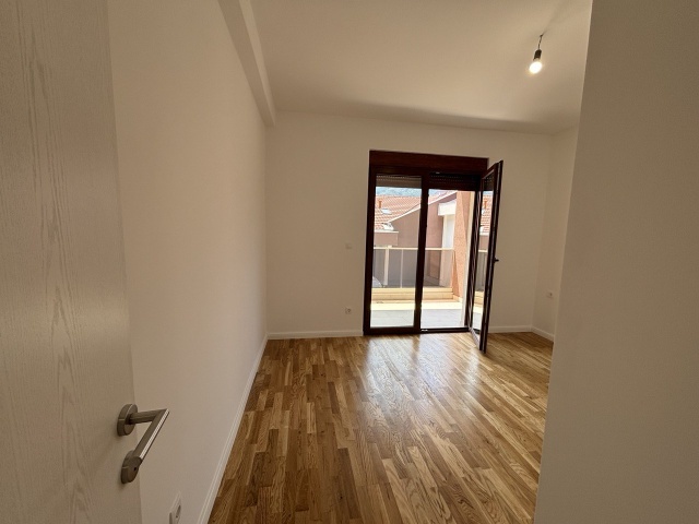 Three bedroom apartment in a new residential building in Kotor, Dobrota