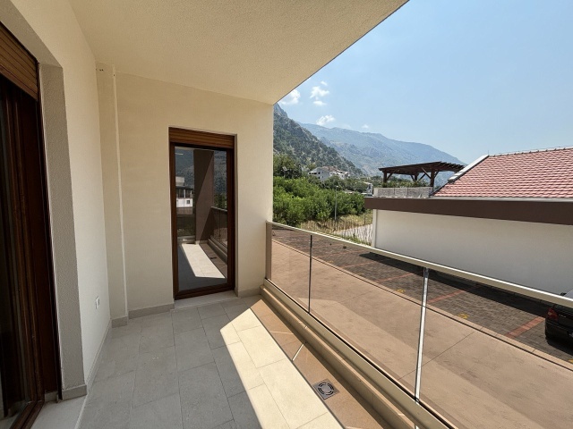 Three bedroom apartment in a new residential building in Kotor, Dobrota