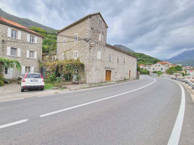 Stone house on the first line of the sea in Bay of Kotor