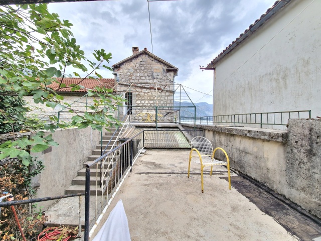 Stone house on the first line of the sea in Bay of Kotor