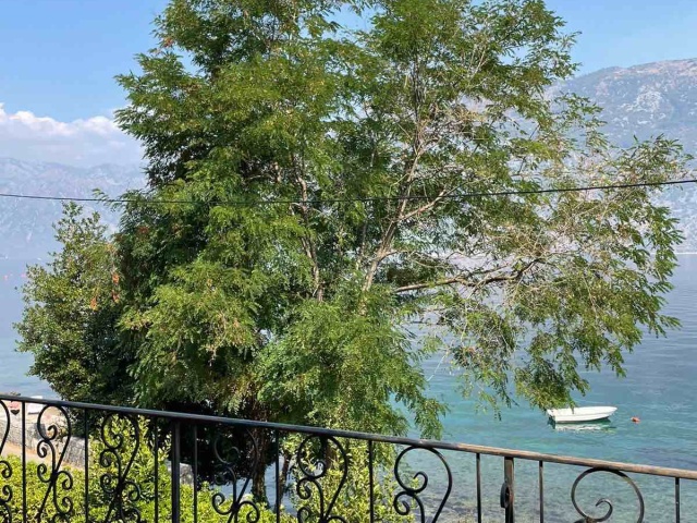 House on the first line of the sea in the Bay of Kotor