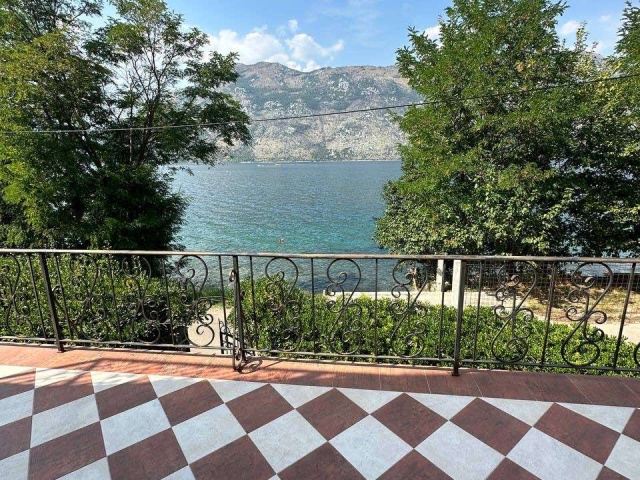 House on the first line of the sea in the Bay of Kotor