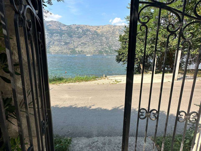 House on the first line of the sea in the Bay of Kotor