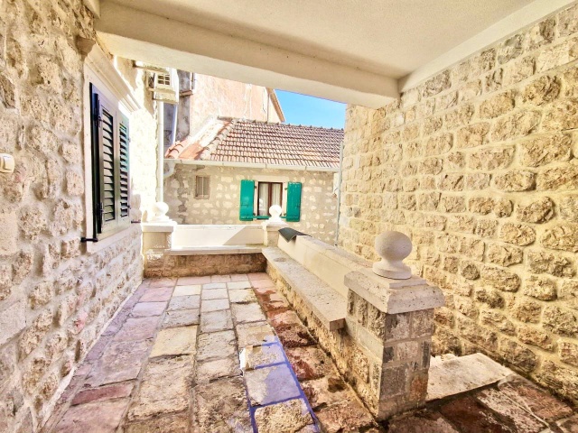 Two stone houses with a restaurant on the first line of the sea
