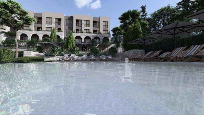 Apartments for sale in a new residential complex with a swimming pool