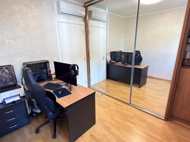 Luxury penthouse with panoramic sea views, rooftop terrace.