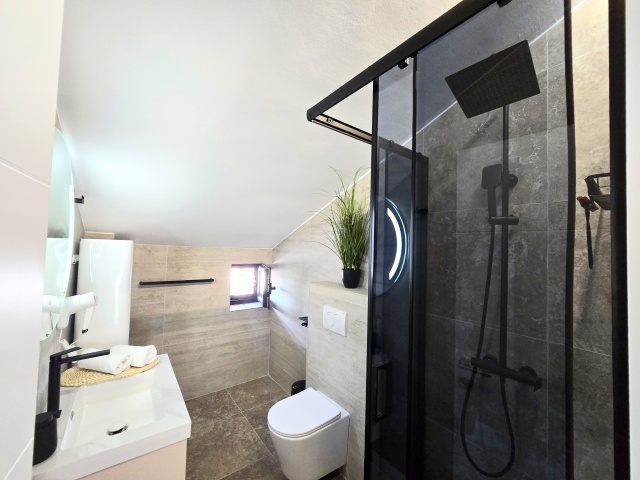 For sale is a completely renovated three-story hotel in the  Budva