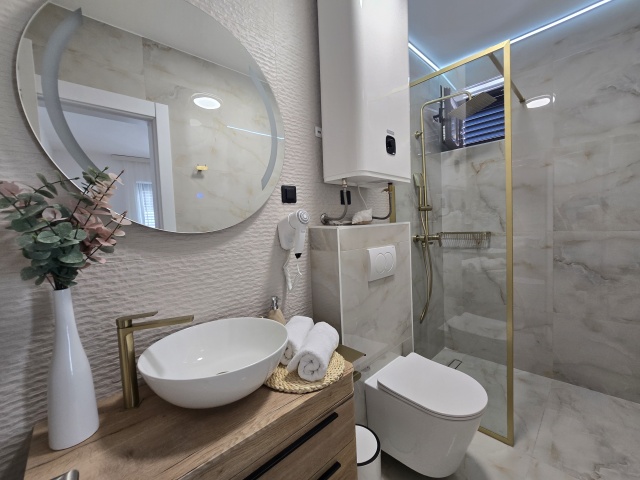 For sale is a completely renovated three-story hotel in the  Budva