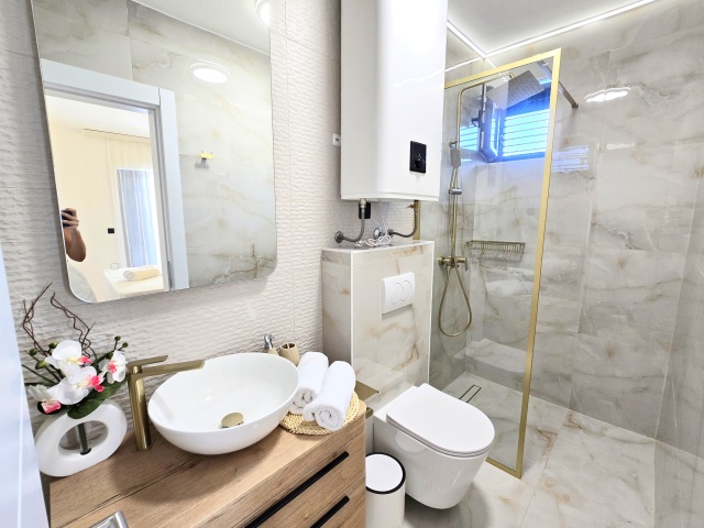 For sale is a completely renovated three-story hotel in the  Budva