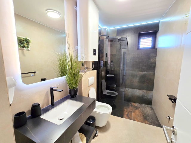 For sale is a completely renovated three-story hotel in the  Budva