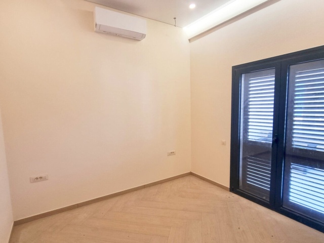 A comfortable and sunny apartment in Dobrota is for sale